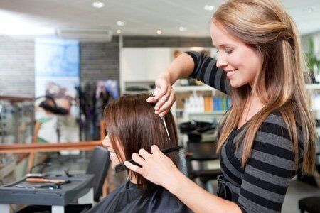 Hairdresser Cutting Client's Hair - Hair Cutting in Mountain View, CA