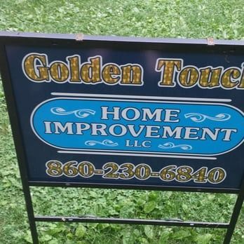 A sign for golden touch home improvement llc