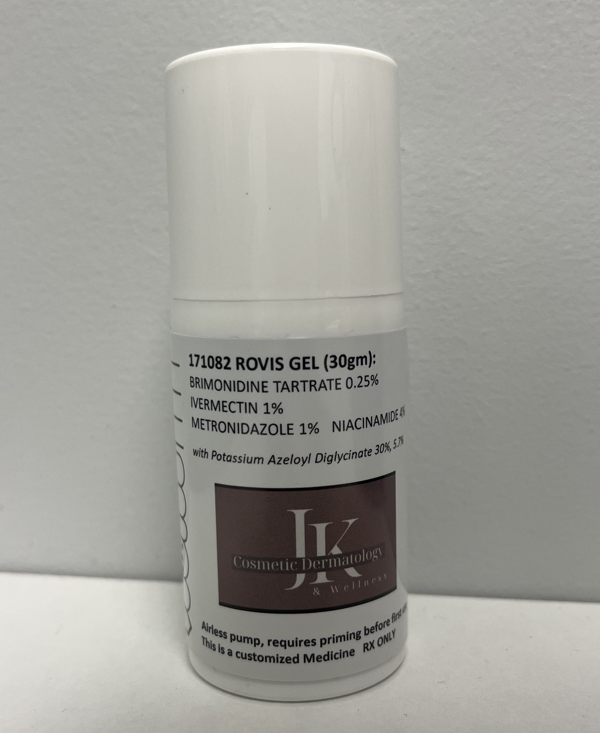 A white pump bottle of rovis gel.