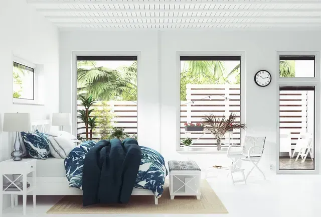 Bright White Bedroom With Large Windows Overlooking Greenery — George Pappas Painting In Buderim, QLD