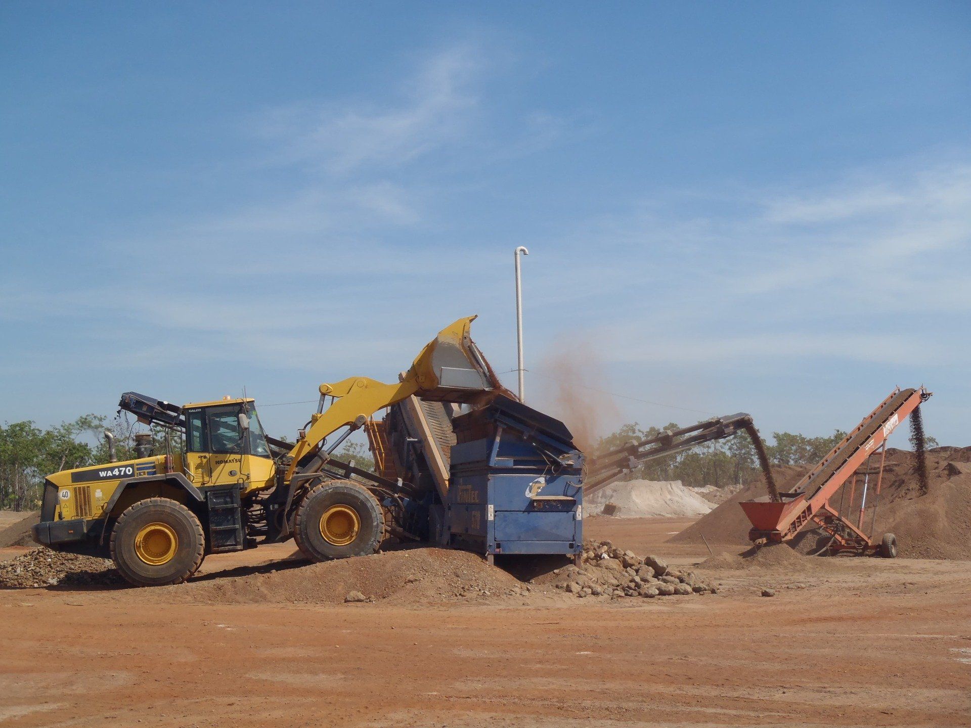 Dirt Being Dumped Into Large Skip Bin - Lavercombe Quarries