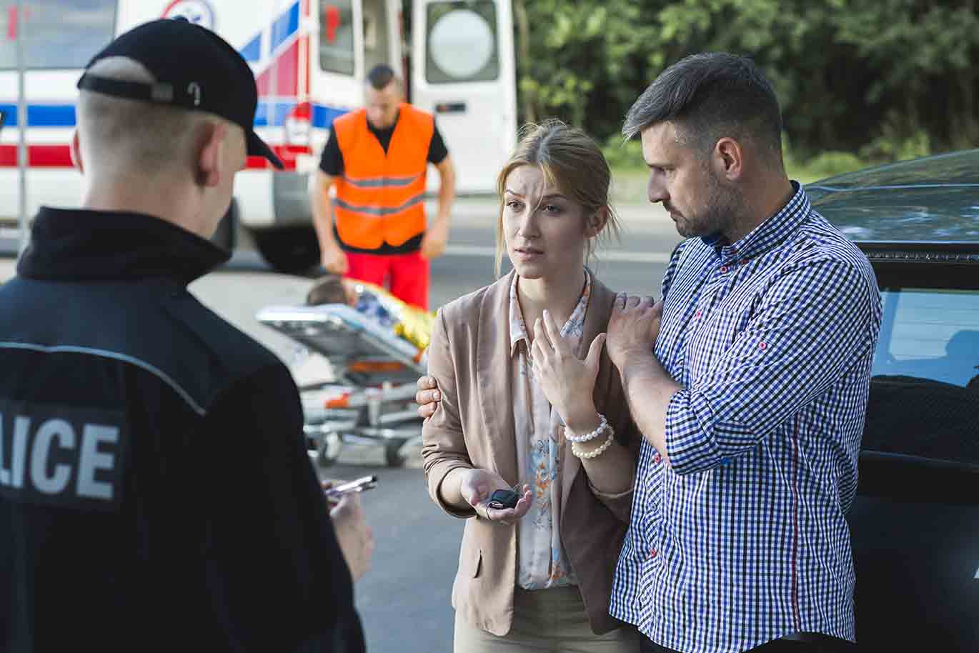 senior couple discussing with a lawyer.