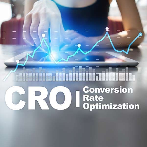 female marketer interacting with a tablet; a glowing chart overlays the image, labeled 