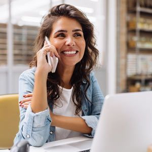 woman about to Contact Solution Web Designs and Learn More About Adding Video to Your Website and Online Marketing Efforts