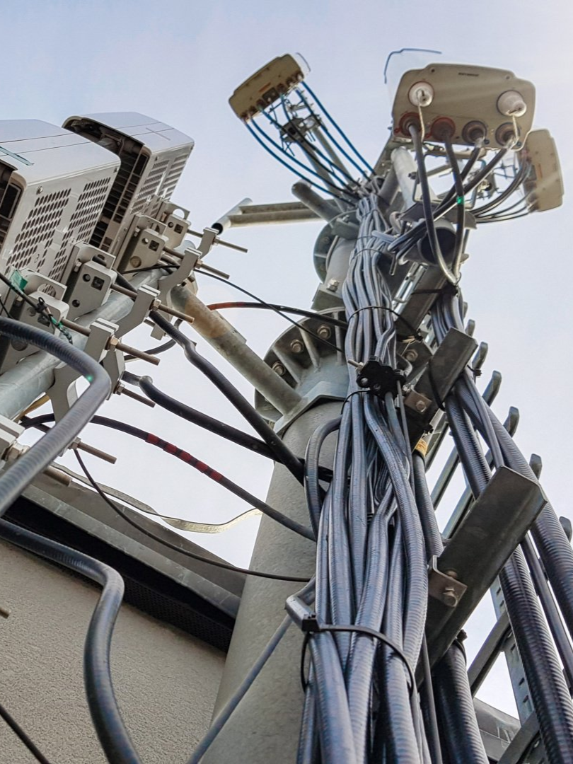 View upwards of antenna mast with cabling. 