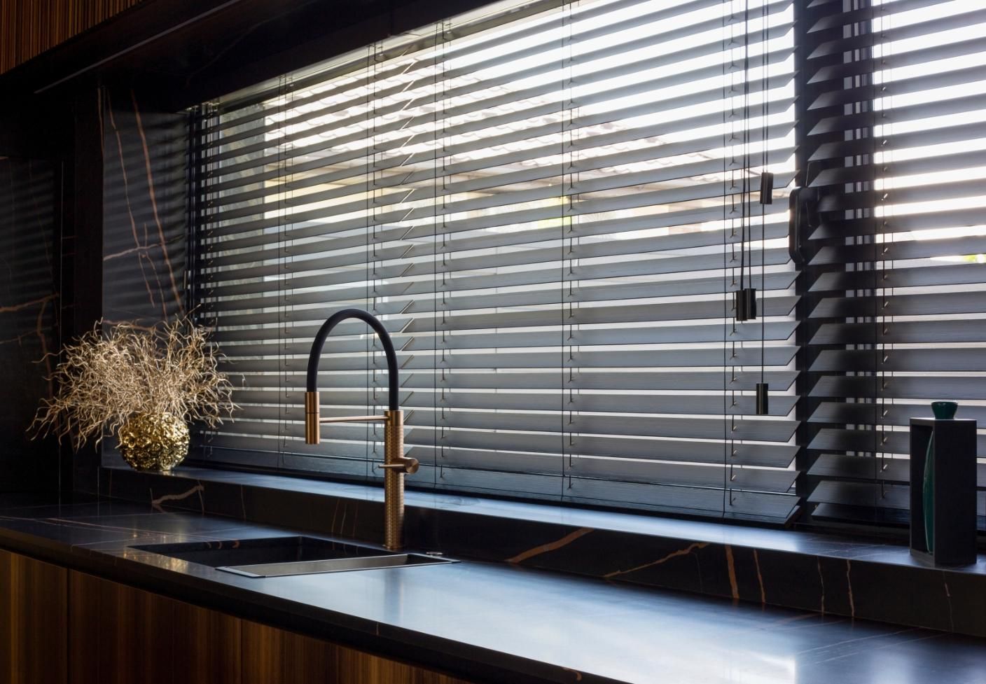 A Kitchen With a Sink and a Window With Blinds — Atherton Decor Centre In Atherton, QLD