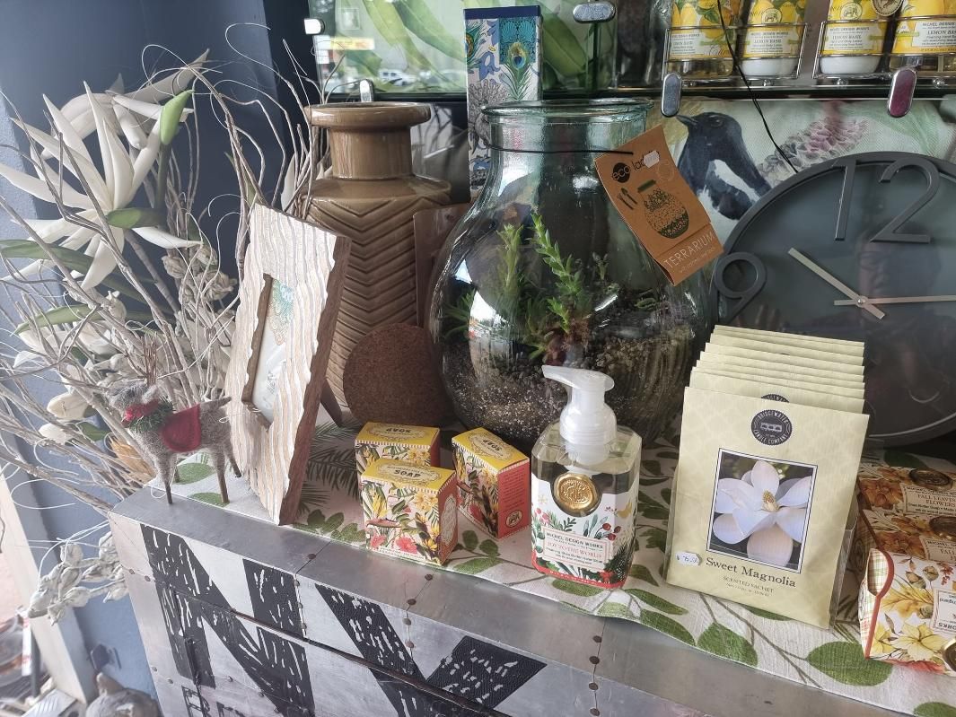 A Table With a Vase , Soap , Candles , and a Clock on It — Atherton Decor Centre In Atherton, QLD