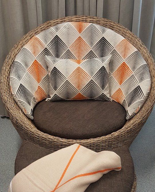 A Wicker Chair With a Geometric Pattern on the Seat — Atherton Decor Centre In Mareeba, QLD