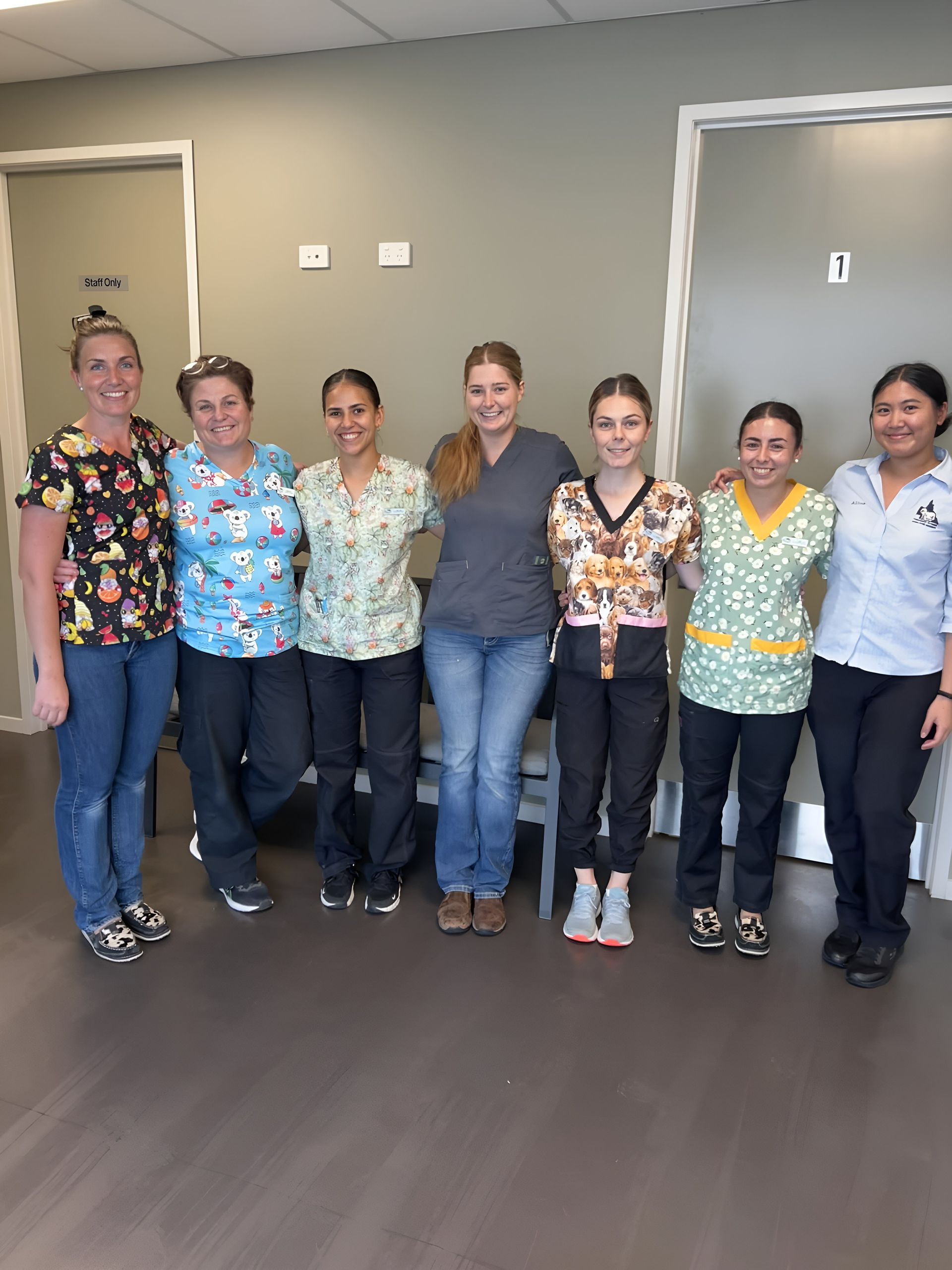 A Group Of Nurses Are Posing For A Picture — Valley Vet Surgery In Walkerston, QLD