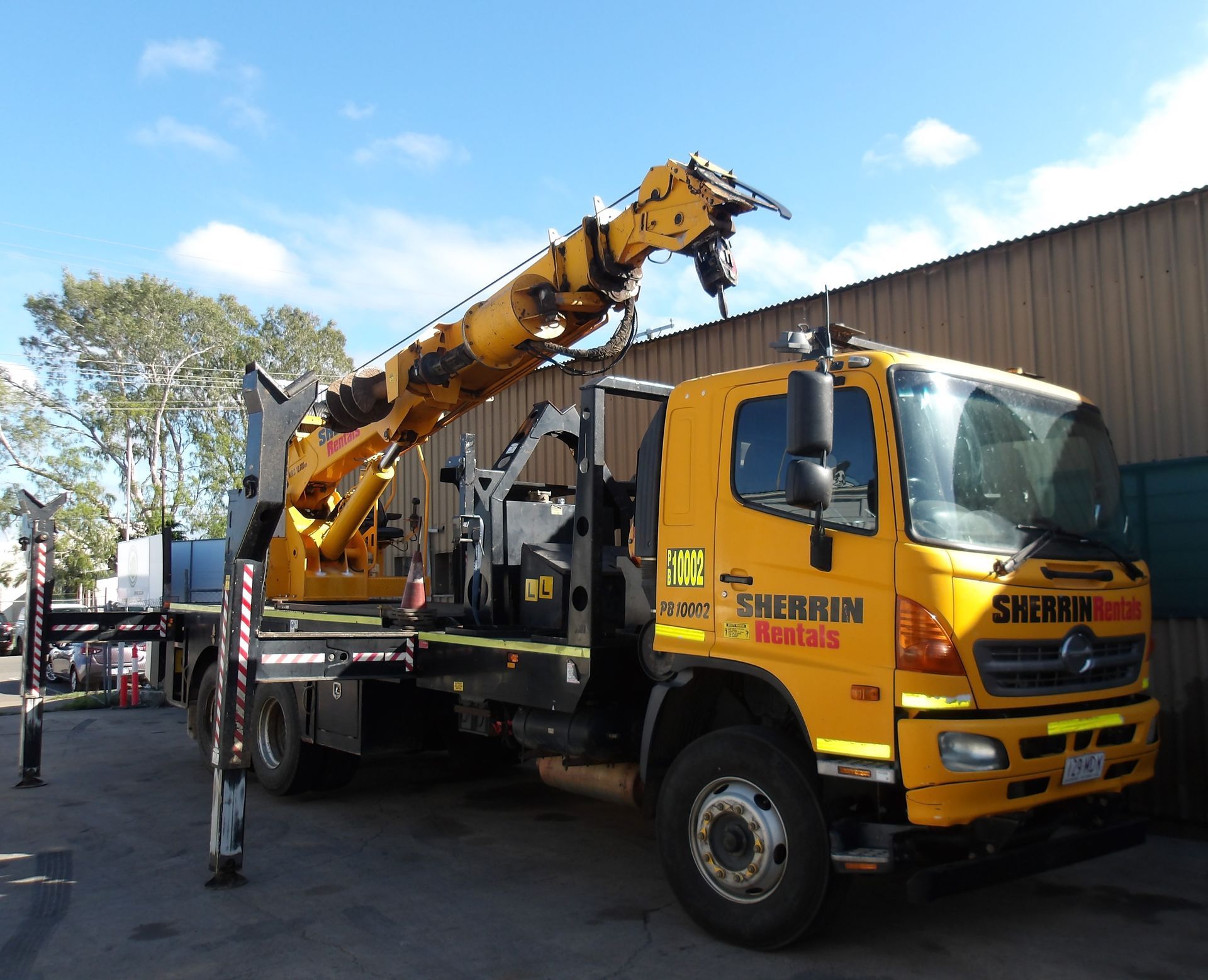 Yellow Truck with Crane— OG Diesel NQ in Garbutt, QLD