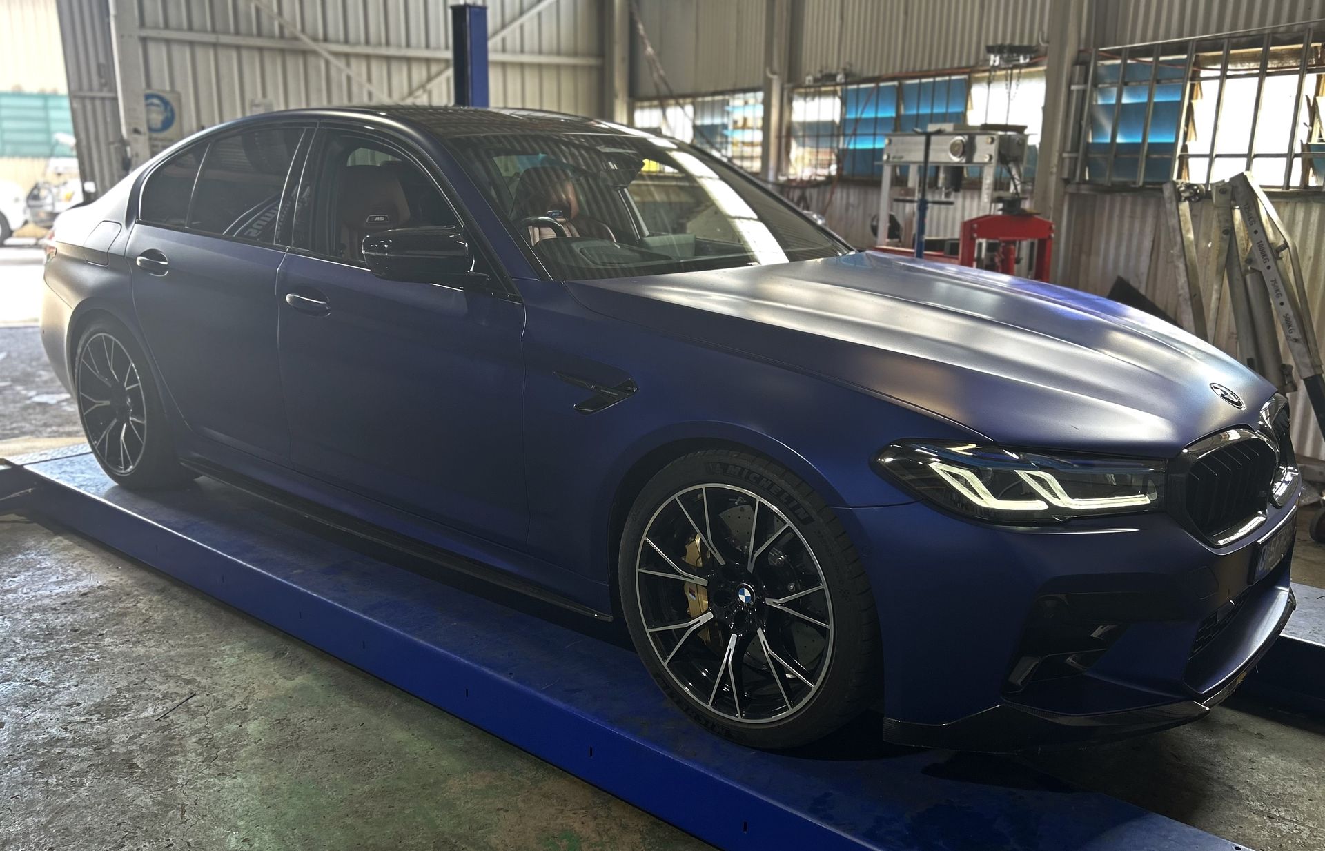 Blue BMW in a workshop— OG Diesel NQ in Garbutt, QLD