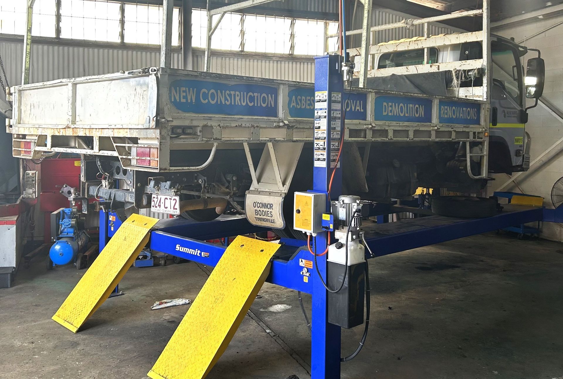 A Truck On The Hoist— OG Diesel NQ in Garbutt, QLD