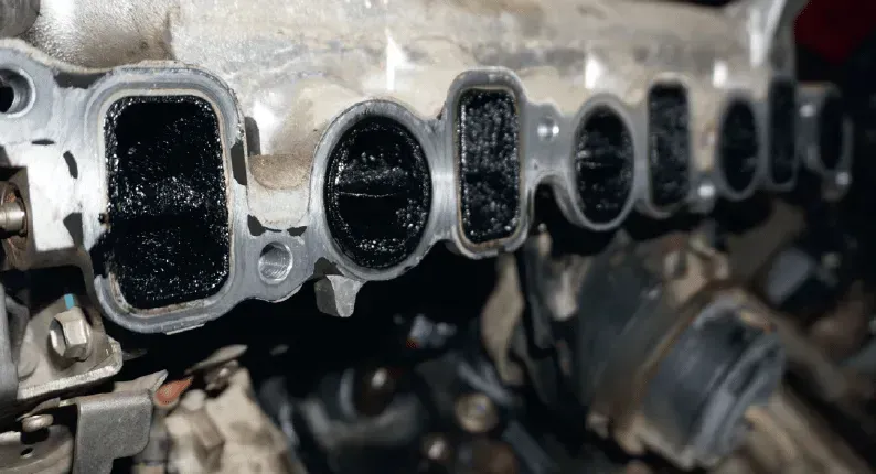 A Close Up of a Dirty Intake Manifold on a Car Engine — OG Diesel NQ in Garbutt, QLD