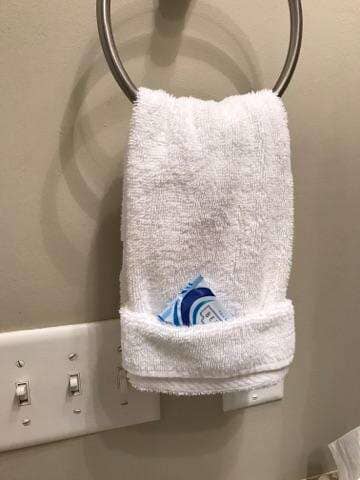 Recurring Cleaning — Towel Hanging on Metal Ring in Crestview, FL