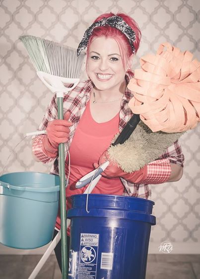 Residential and Commercial Cleaning — Woman with Rad Hair And Shirt With Cleaning Materials in Crestview, FL