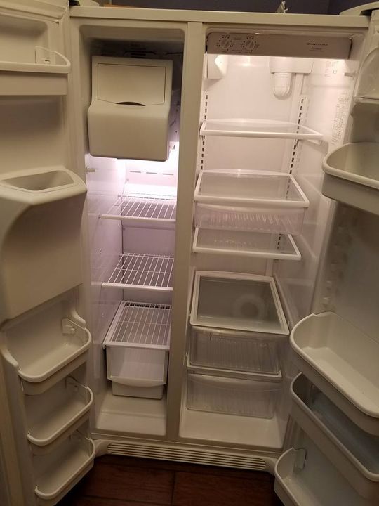 Crestview Carpet Residential and Commercial Cleaning — Opened Refrigerator in Crestview, FL