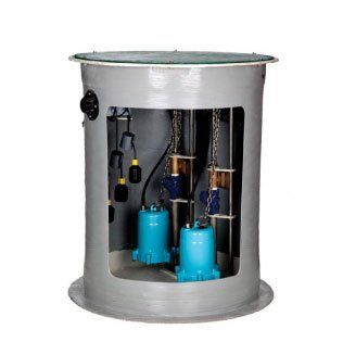 Un cylindre gris avec deux pompes bleues à l'intérieur