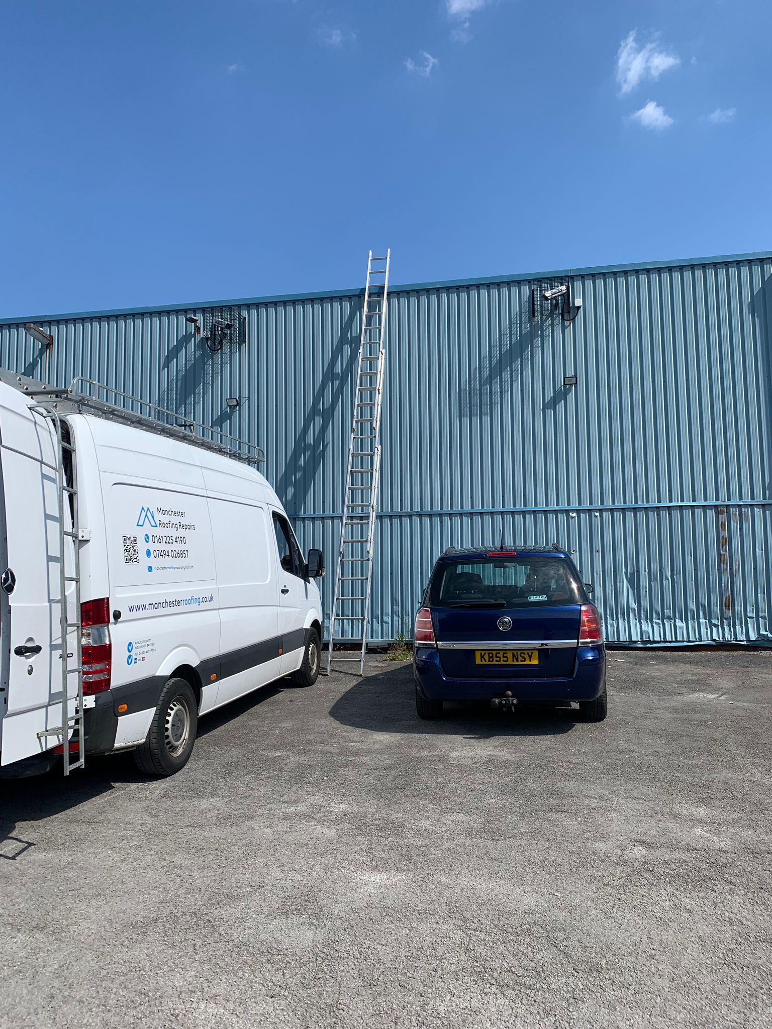 A picture of the Manchester roofing team carrying out a commercial roof repair