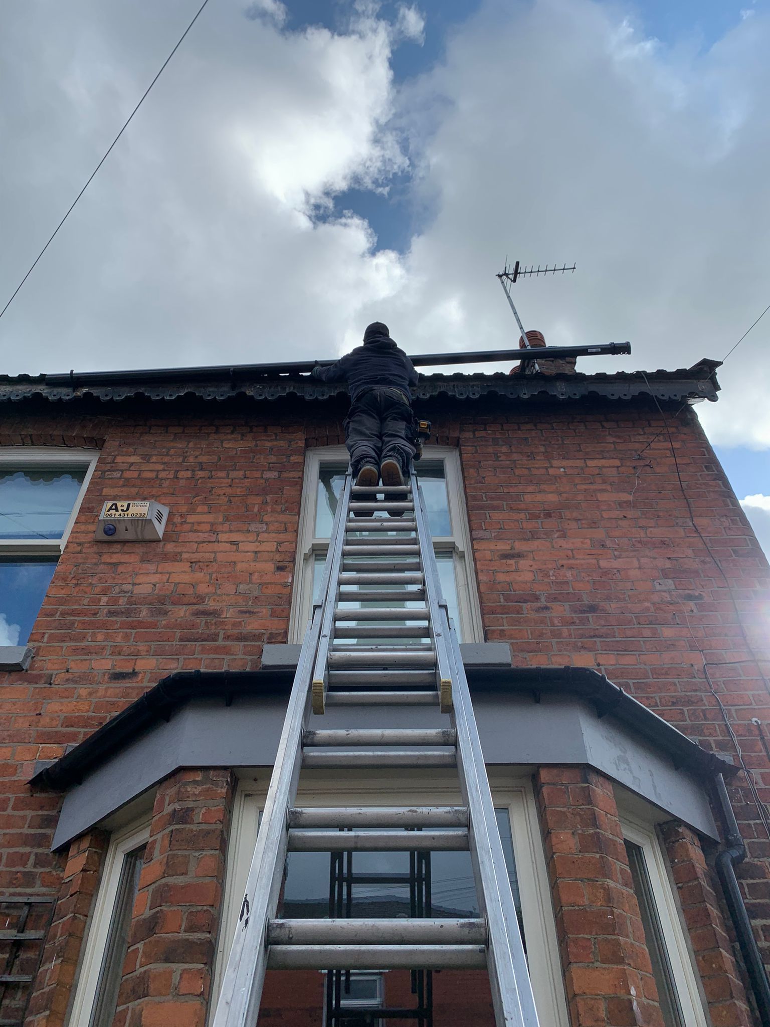 A picture of a fascia and soffit replacement being carried out by Roofers Manchester