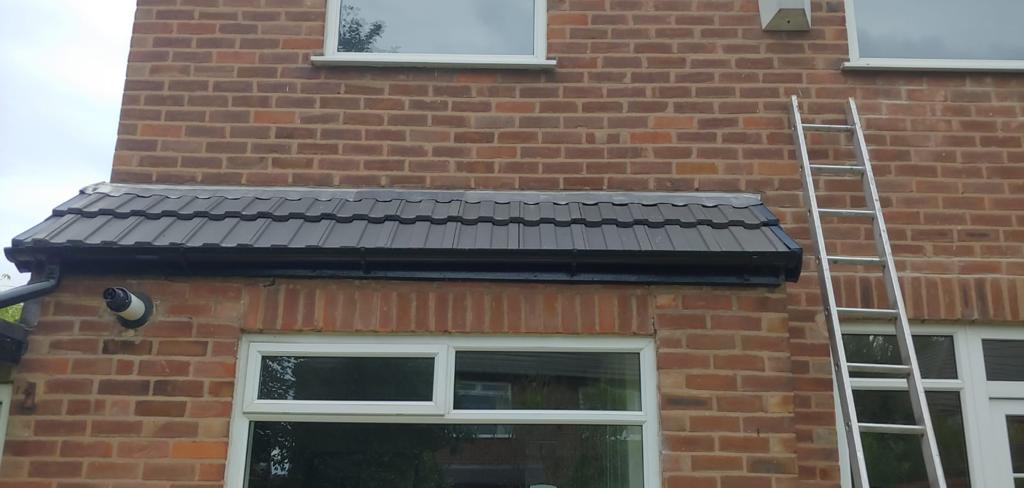 A picture of roof extension with new fascia and soffit by Roofers Manchester