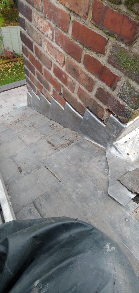 A picture of a lead chimney flashing repair carried out by Roofers Manchester