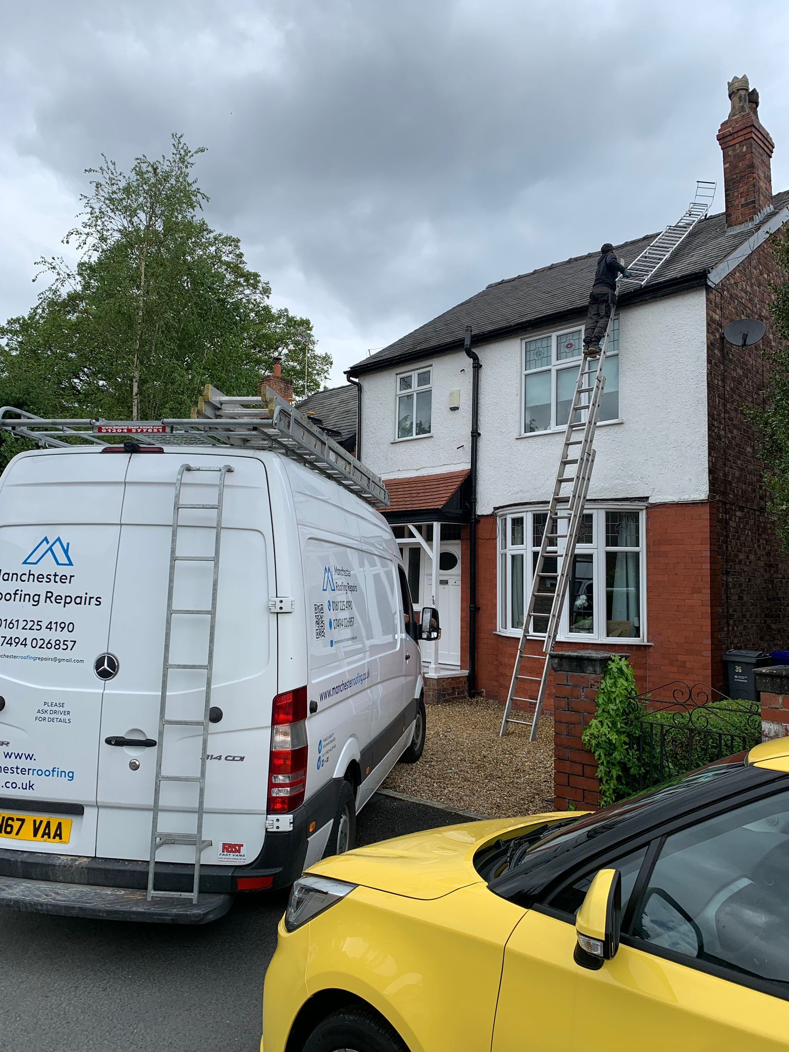 A picture of the Manchester Roofing Repairs team carrying out a roof repair on a home in Manchester