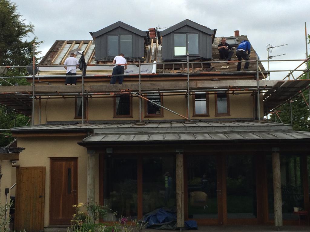 picture of roofers in Manchester replacing a dormer roof