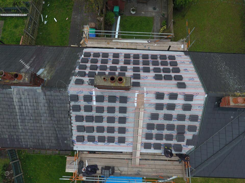 picture of a roof during replacement by roofers Manchester