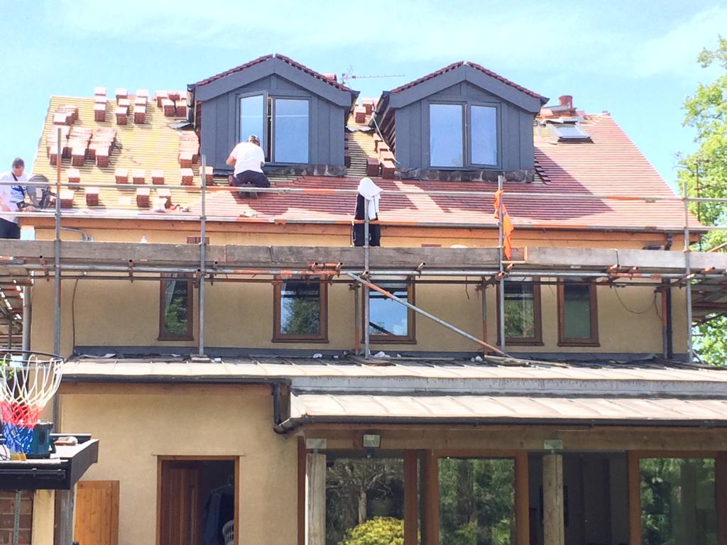 Picture of a new dormer roof during replacement by Roofers Manchester