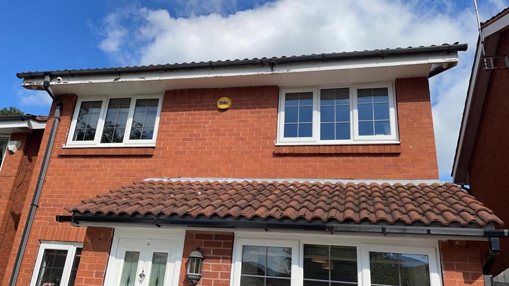 A picture of a tiled roof extension by Roofers Manchester