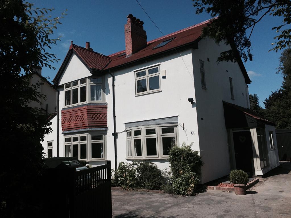 Picture of a detached property that has a new roof installed by Roofers Manchester