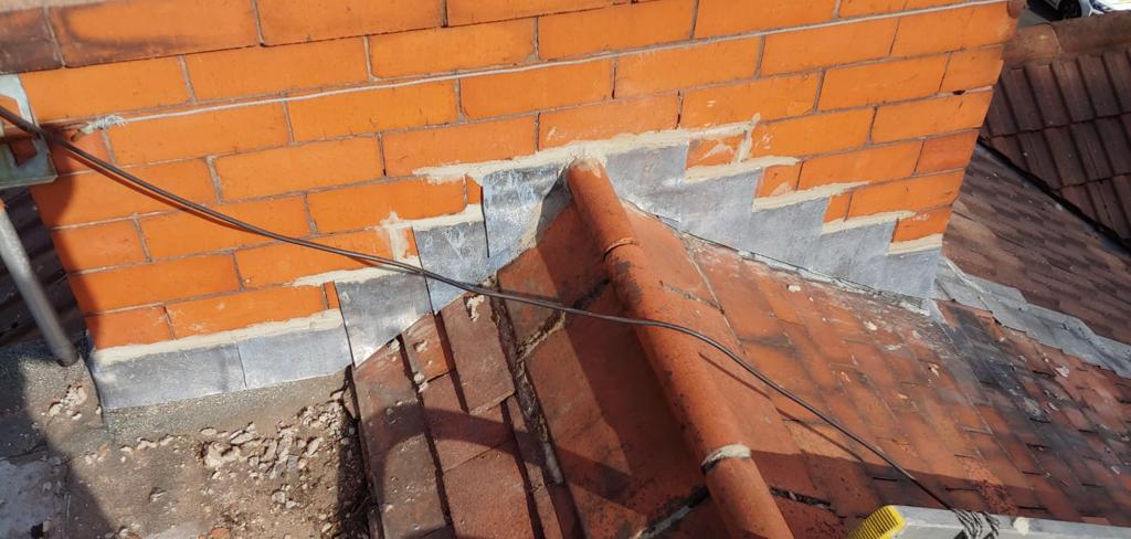 A picture of a porch flashing repair carried out by Roofers Manchester