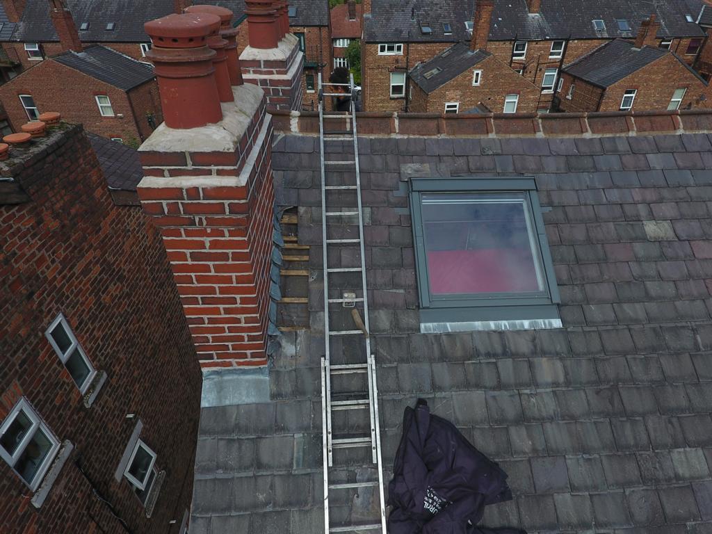 A picture of chimney stack that has been re-flaunched by Roofers Manchester
