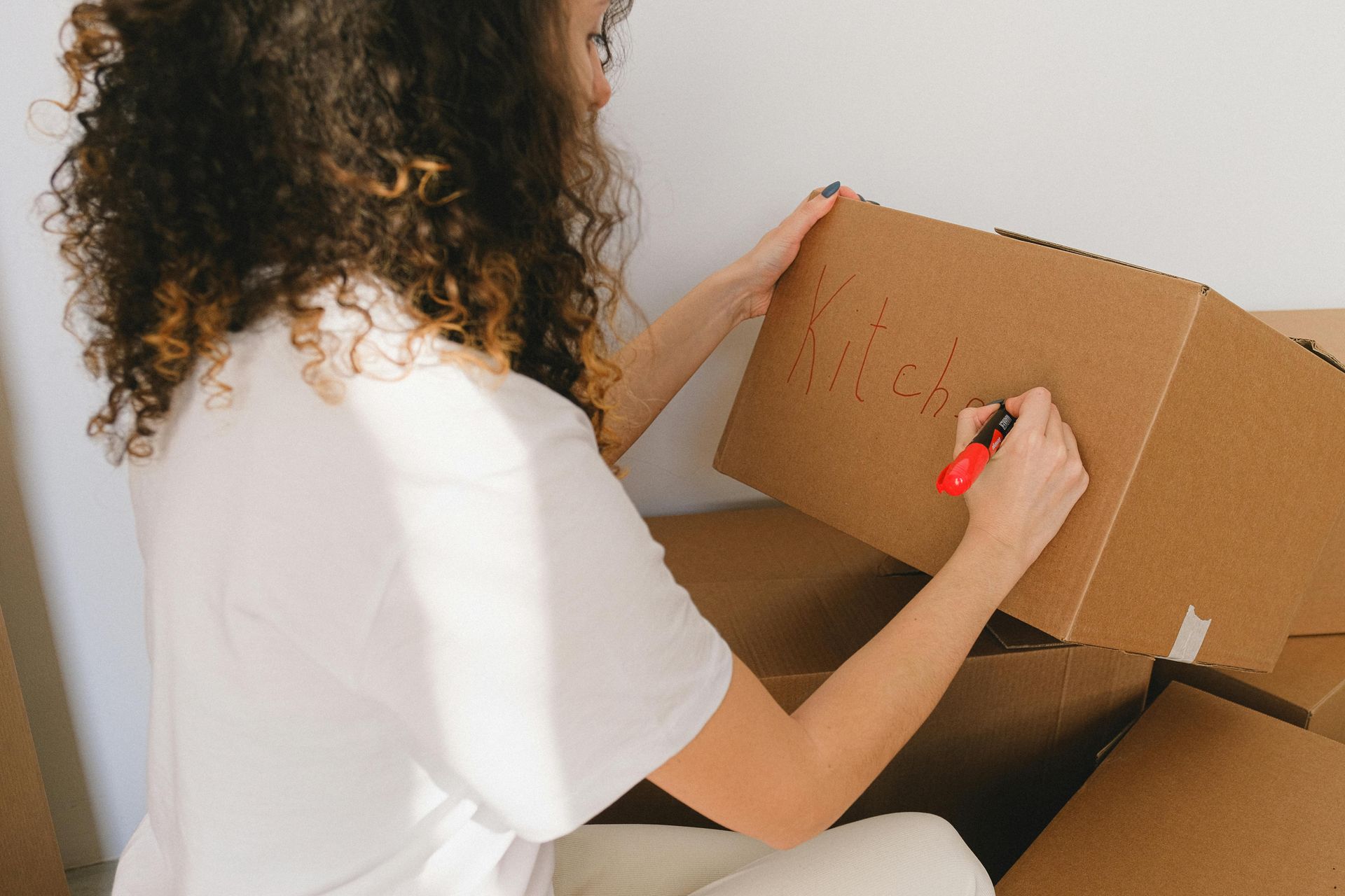Unpacking after a move into your new home is one of our specialties! We love designing new spaces.