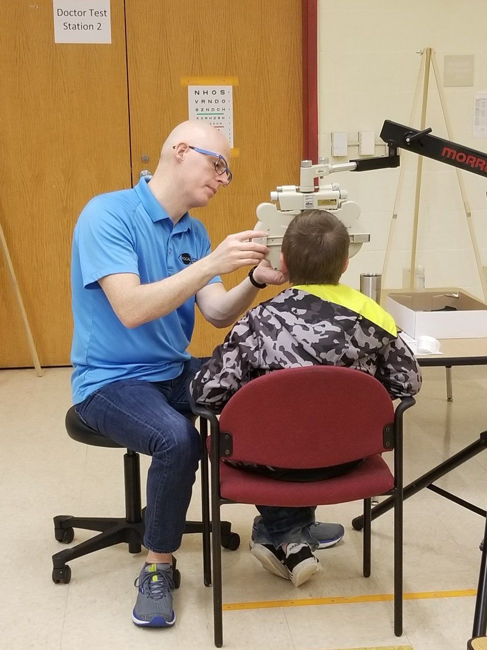 Dr. Lyons providing an eye exam