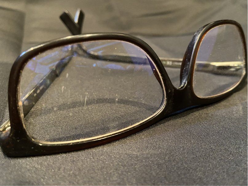 Glasses with scratched lenses