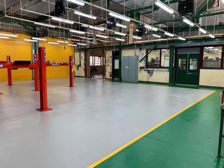 Automotive Workshop Interior — Epoxy Floor Coating in Mackay, QLD