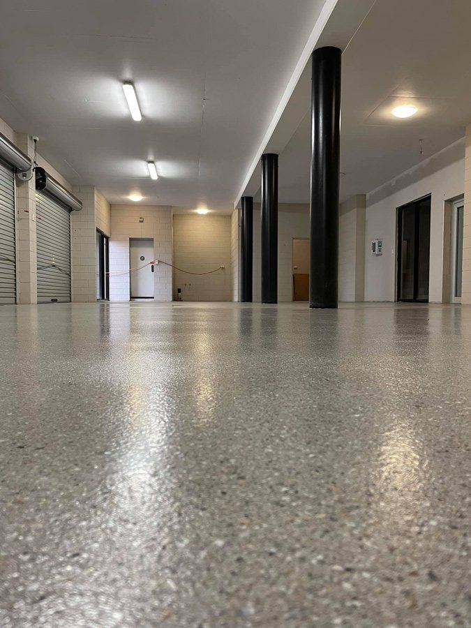 Close Up Floors Of Storage Units — Epoxy Floor Coating in Sarina, QLD
