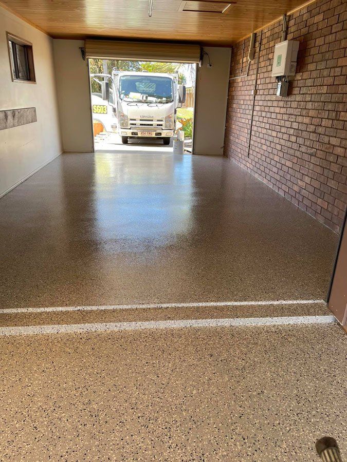 Truck Outside Garage — Epoxy Floor Coating in Whitsundays, QLD