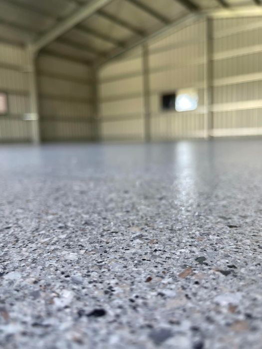 Worker Using Floor Polisher — Epoxy Floor Coating in Mackay, QLD