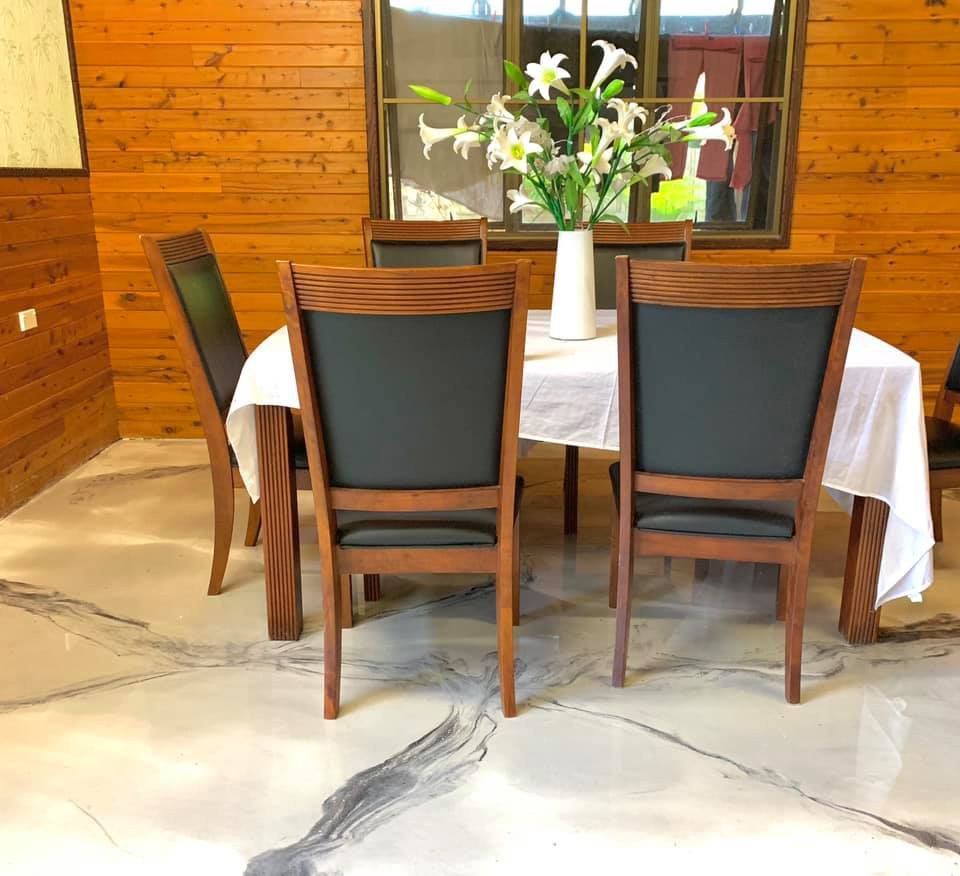 Dining Area With Marble Flooring — Epoxy Floor Coating in Mackay, QLD