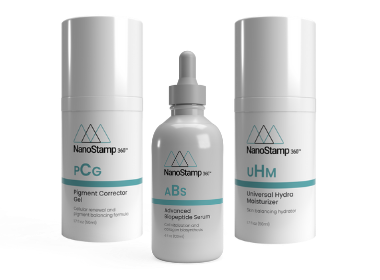 Three bottles of cosmetics are sitting next to each other on a white surface.