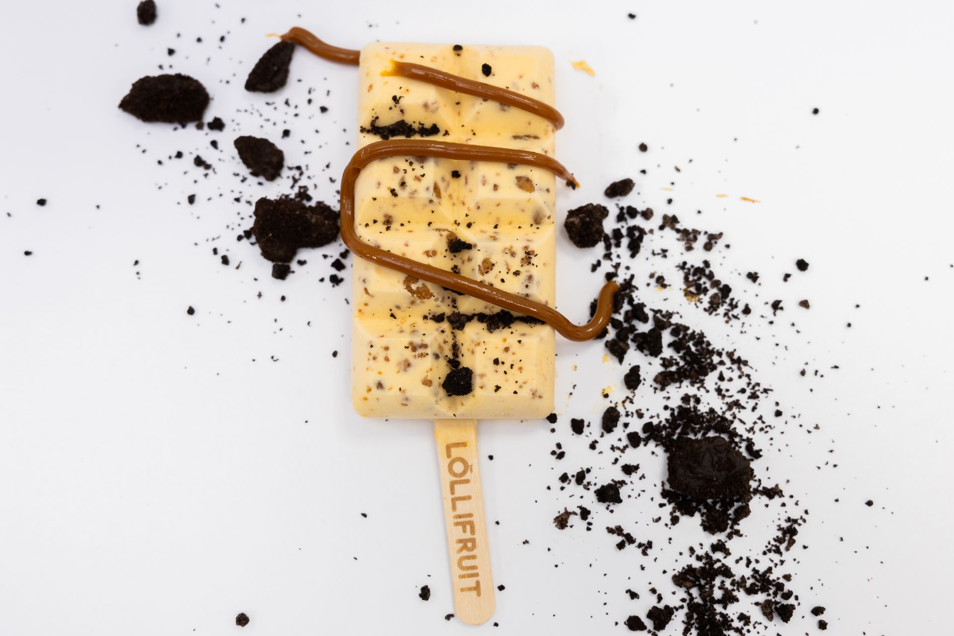 A lollifruit ice cream bar with chocolate and oreos on it