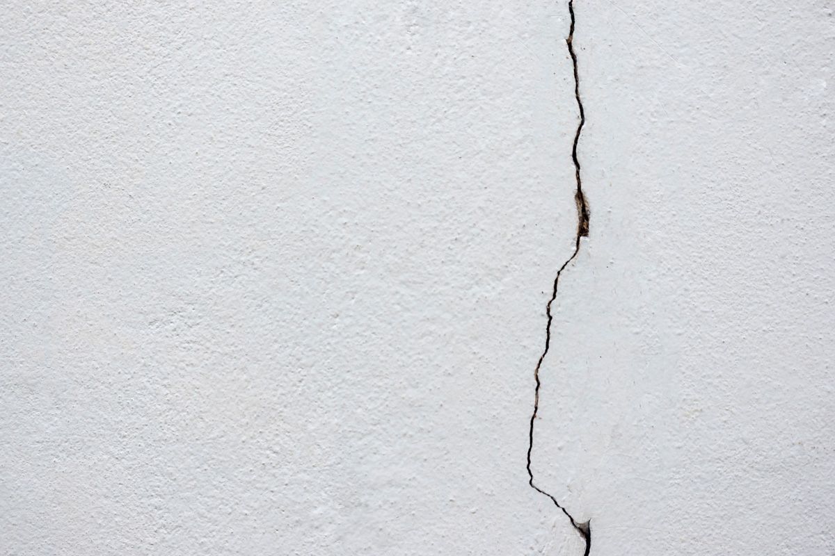 White Wall with Crack — Franksville, WI — Basement Repair By MC Service, LLC