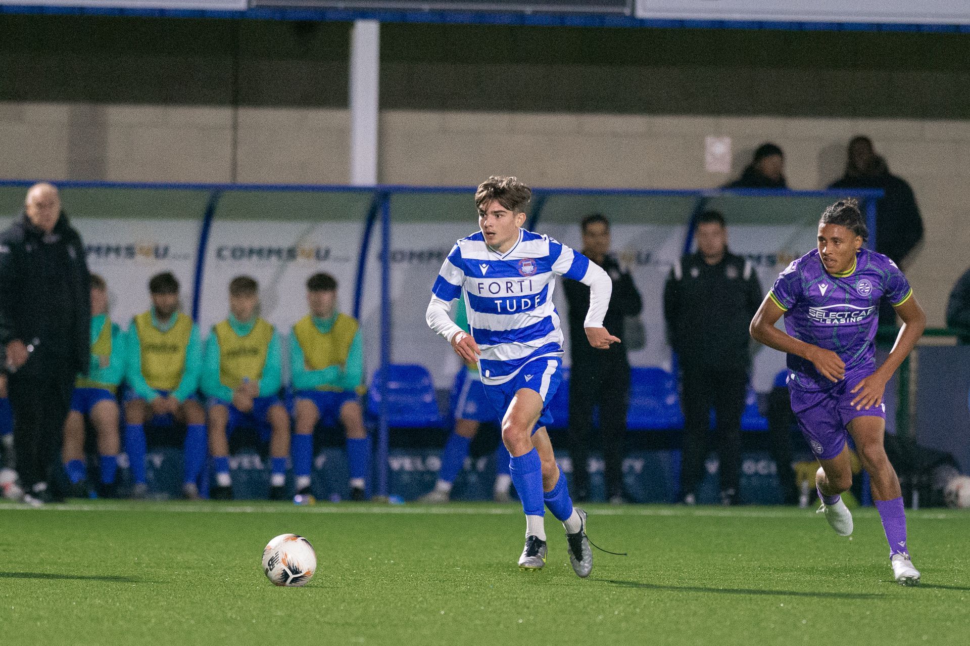 Josh McConnell dribbling with the ball for Oxford City 