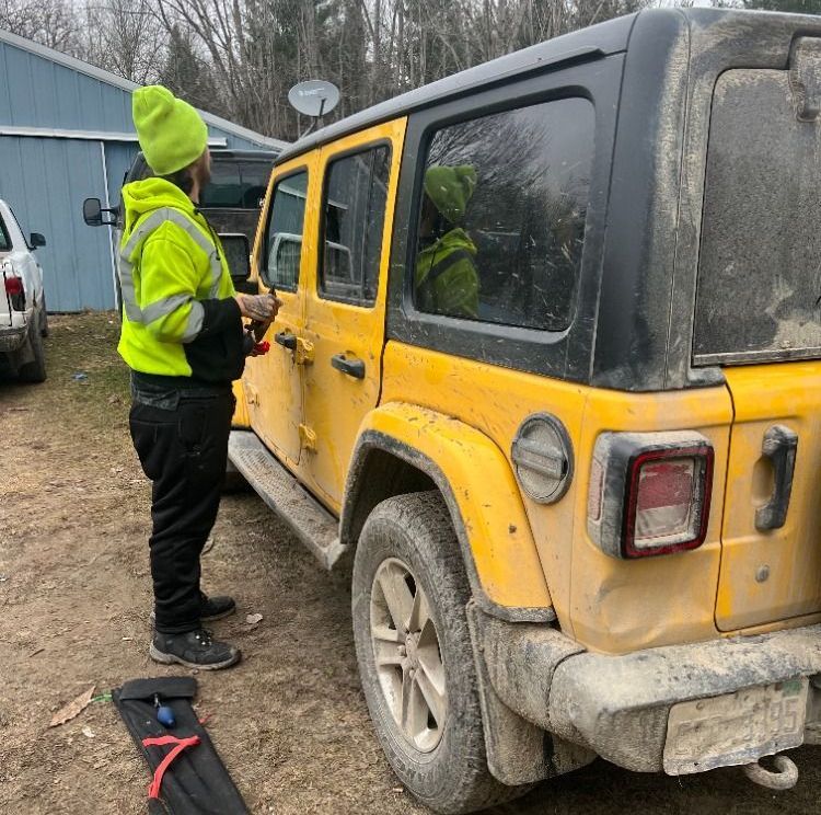 jake unlocking the jeeps door