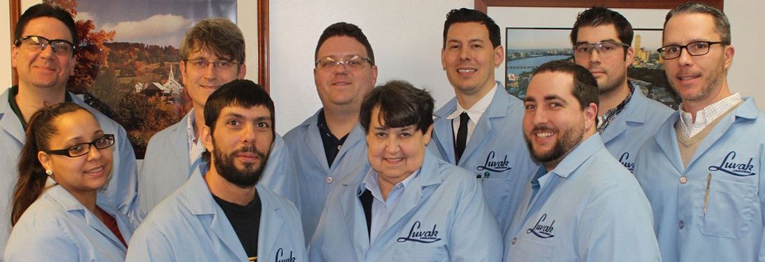 Employees at Luvak Laboratories