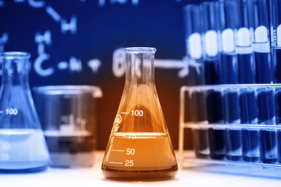 beaker with orange liquid