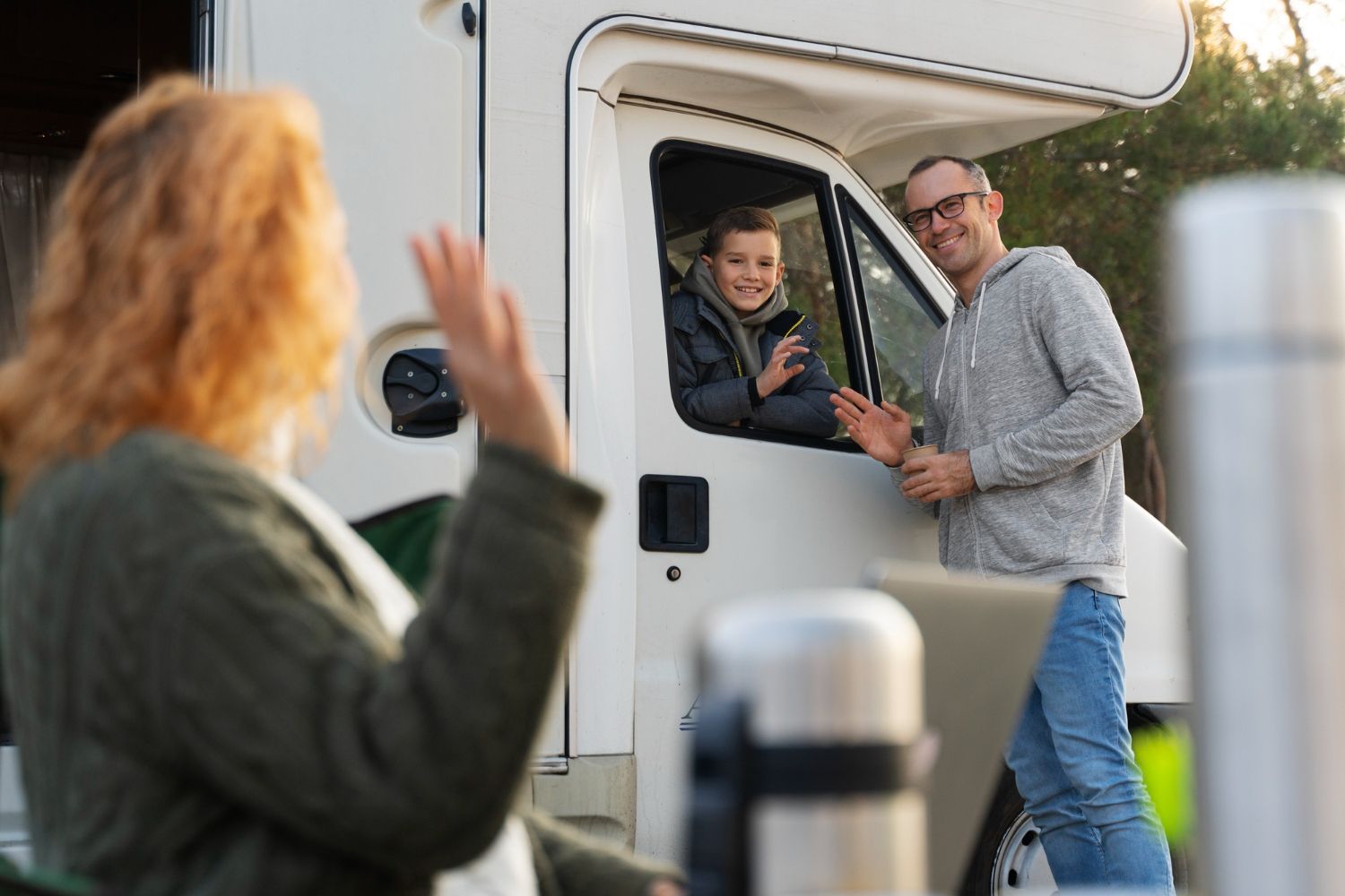 family outside an RV
