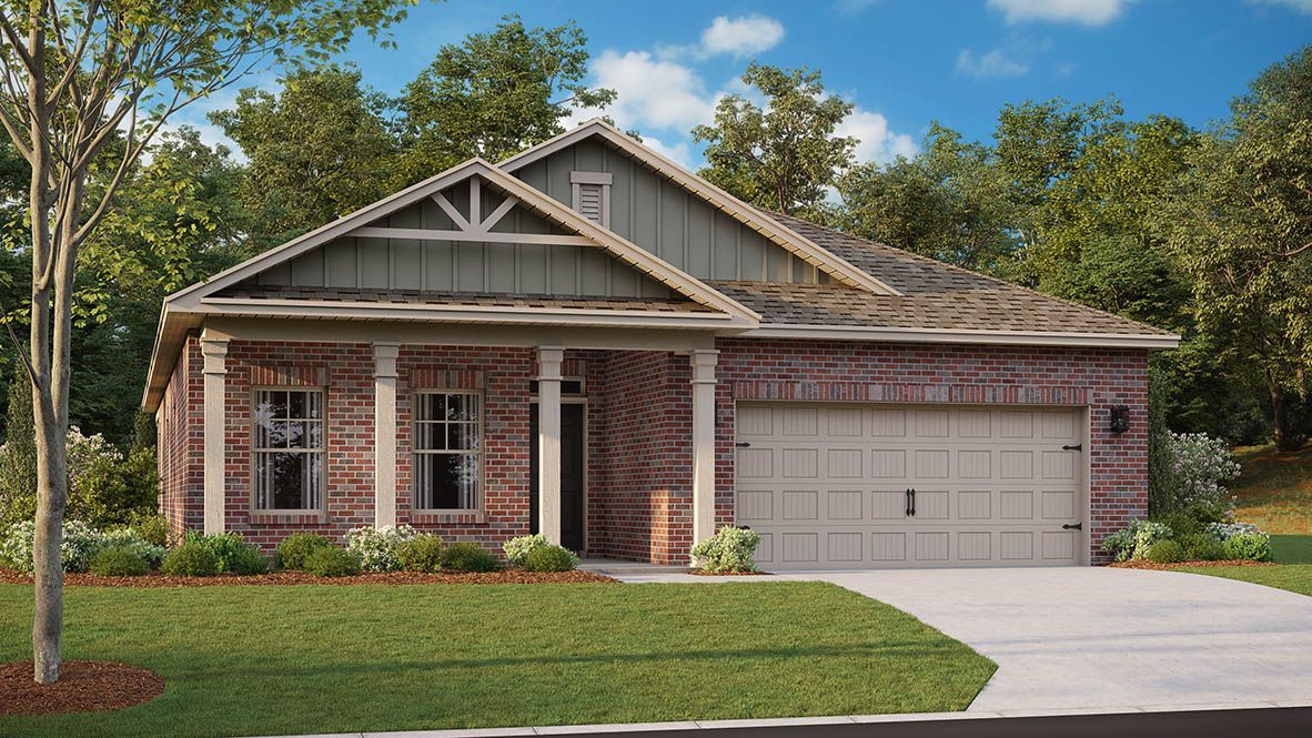 Brick ranch-style house with a covered porch, light garage door, and lush greenery.